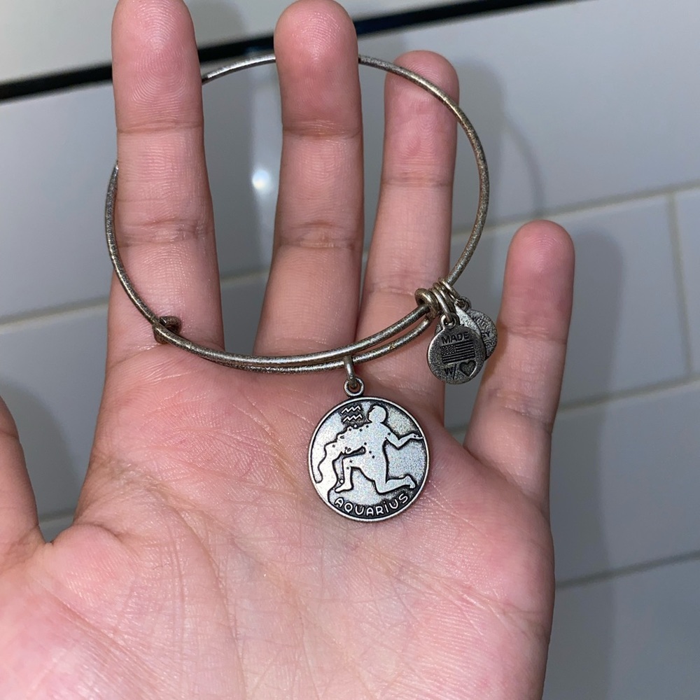 Well worn Aquarius Alex and ani bracelet